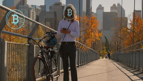 animation of bitcoin symbols over caucasian businessman using smartphone on bridge