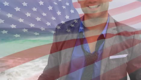 Animation-of-happy-caucasian-man-by-sea-over-flag-of-usa