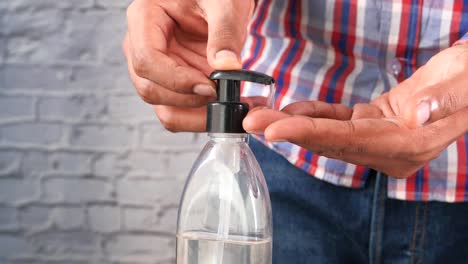 Person Applying Hand Sanitizer