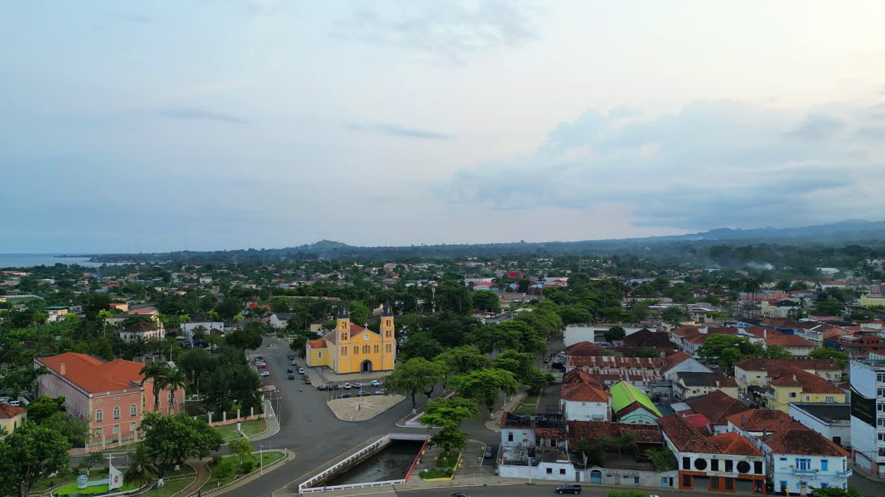 Flying over Ana Chaves Bay with a view of the presidential palace and the church in the city of São Tomé,Africa.