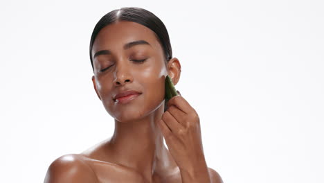 gua sha, beauty and woman with skincare