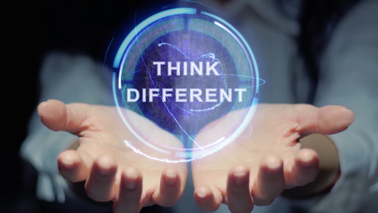 Hands show round hologram Think different
