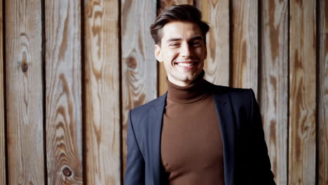 confident and stylish man smiling in a blazer