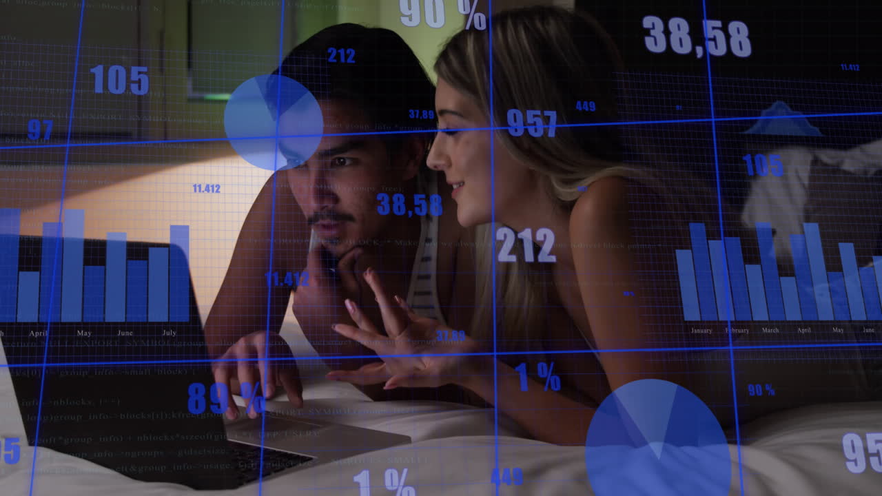 Animation of statistical data processing against biracial couple using laptop in bed at home