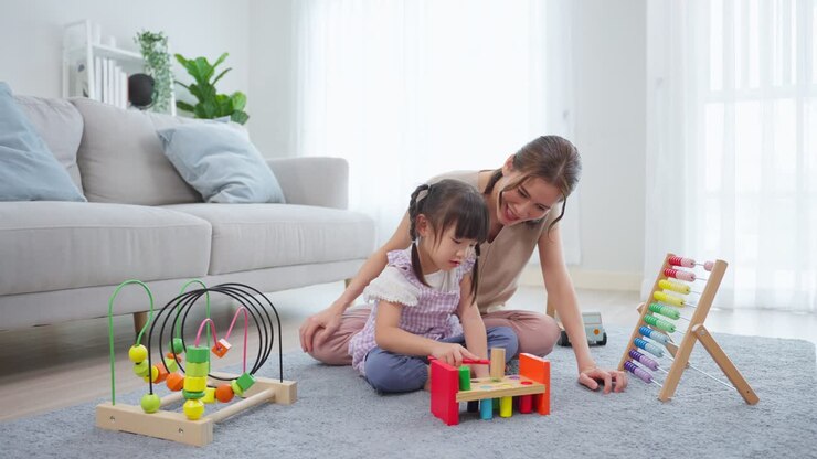 Mother and Daughter Playing Educational Toys at Home