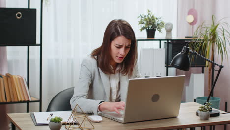Businesswoman programmer software developer loses system error virus bad news data loss at office