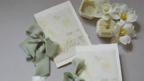 elegant wedding invitations with daffodils and sage green accents