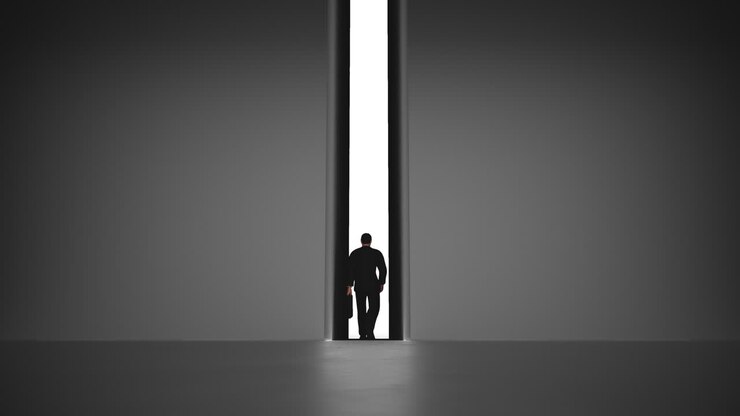 Walking man with a case to the opening gate with alpha channel