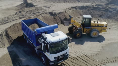 heavy equipment loading sand/gravel