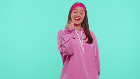 girl smiling excitedly pointing to camera beauty choosing lucky winner indicating to awesome you