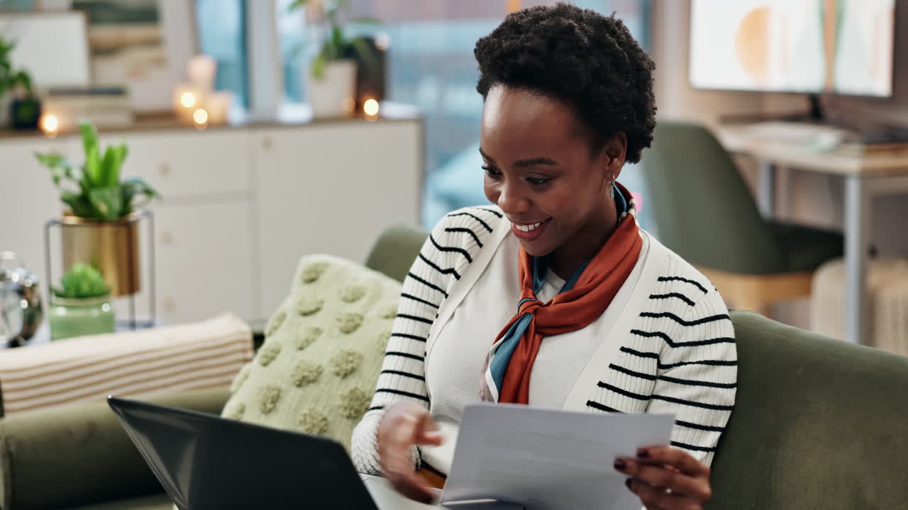 Woman working on laptop at home