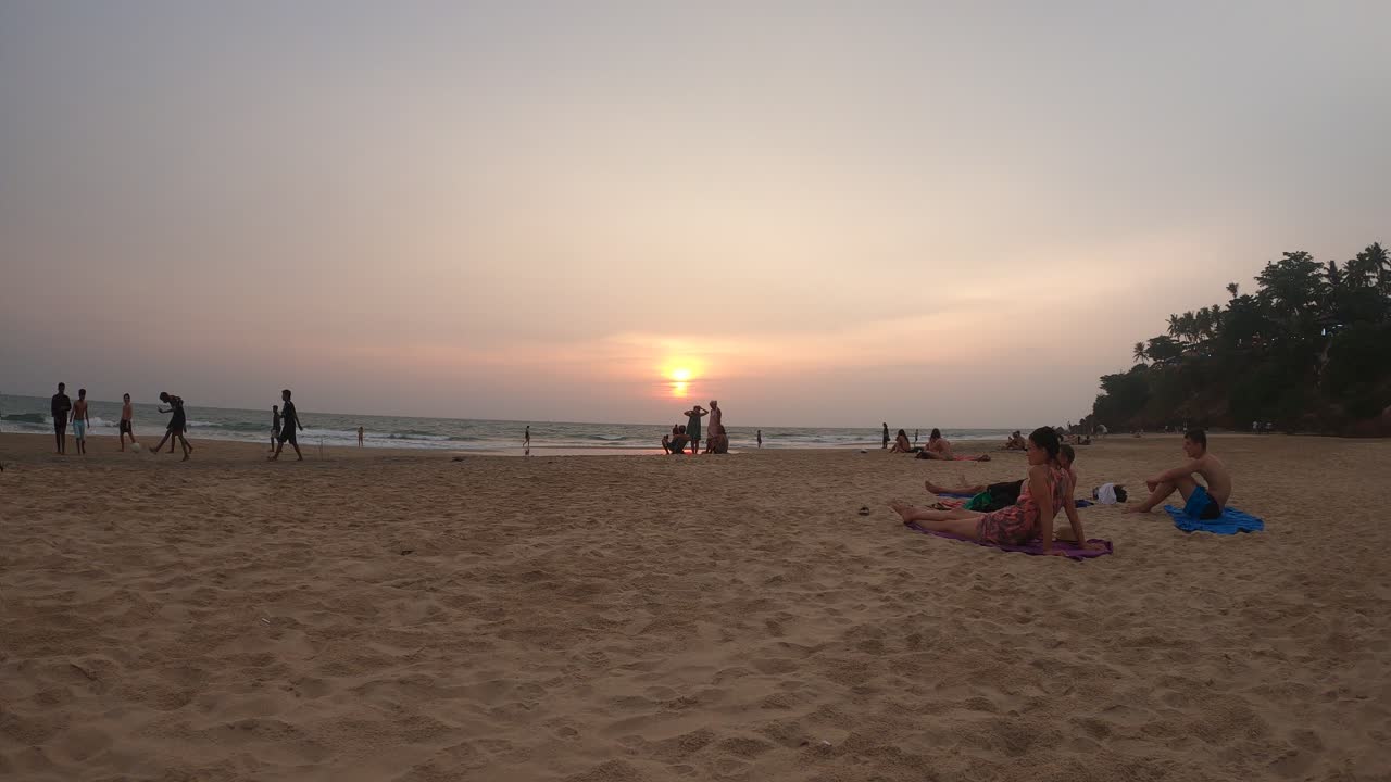 A BEAUTIFUL SUNSET ON A BEACH SIDE IN KERALA,SHOWING THE DIFFERENT COLOURS OF ENVIRONMENT DURING A SUNSET IN 4K.