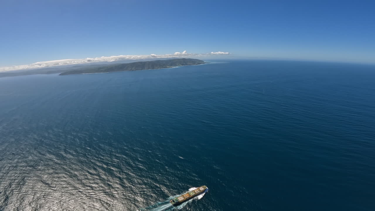 Aerial helicopter shot capturing the journey across the Cook Strait from New Zealand’s South Island to the North Island.