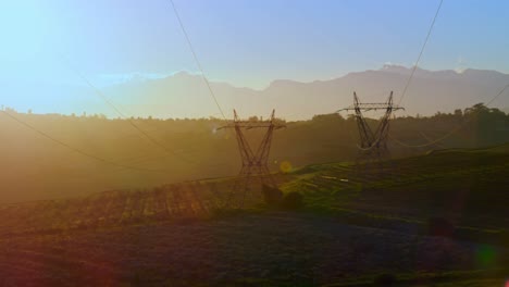 high voltage electric poles on farmland 4k 4k