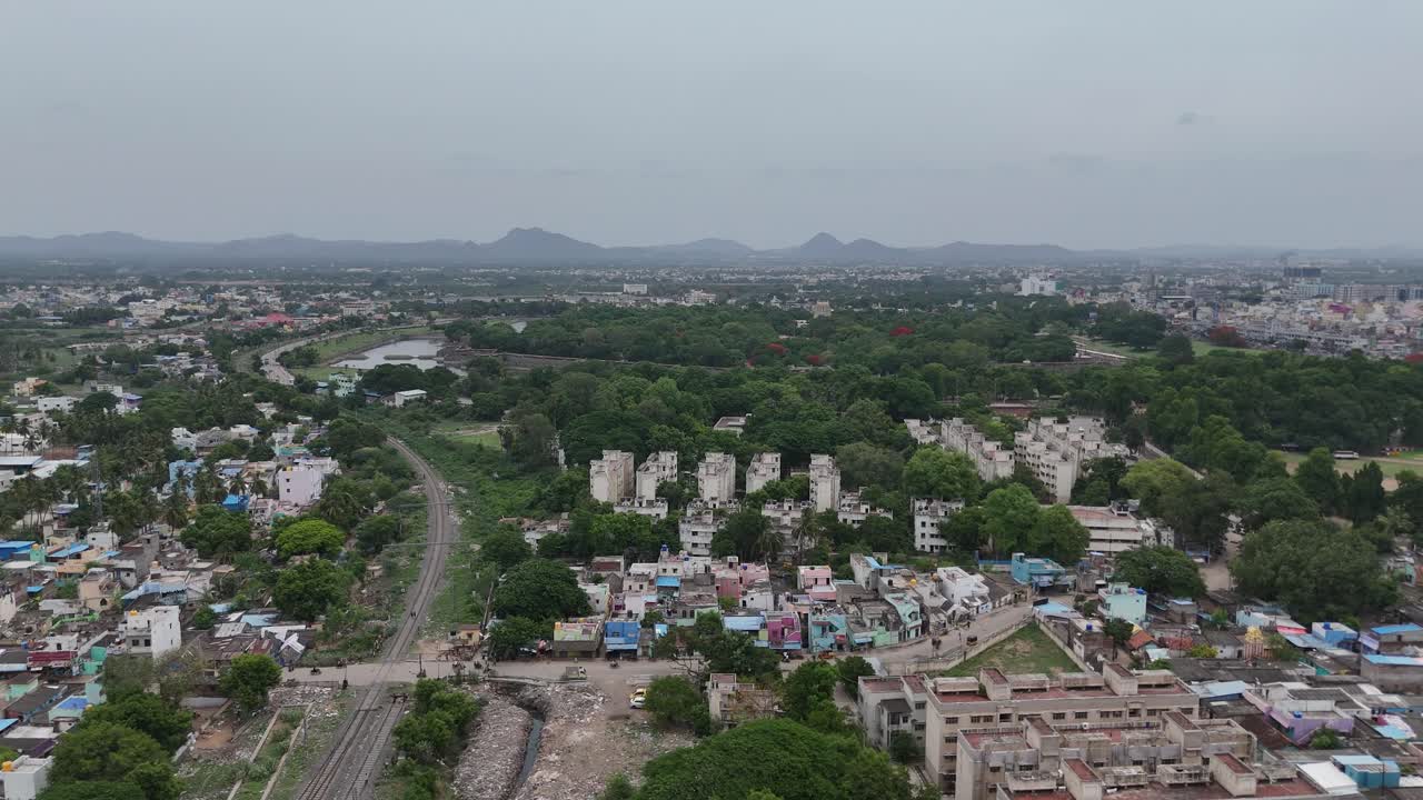 High-angle footage of the highway with expansive grasslands on both sides