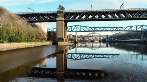 beautiful reflection of bridges on the river tyne, newcastle