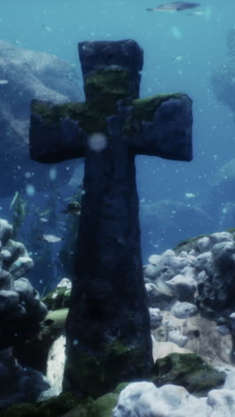 underwater stone cross