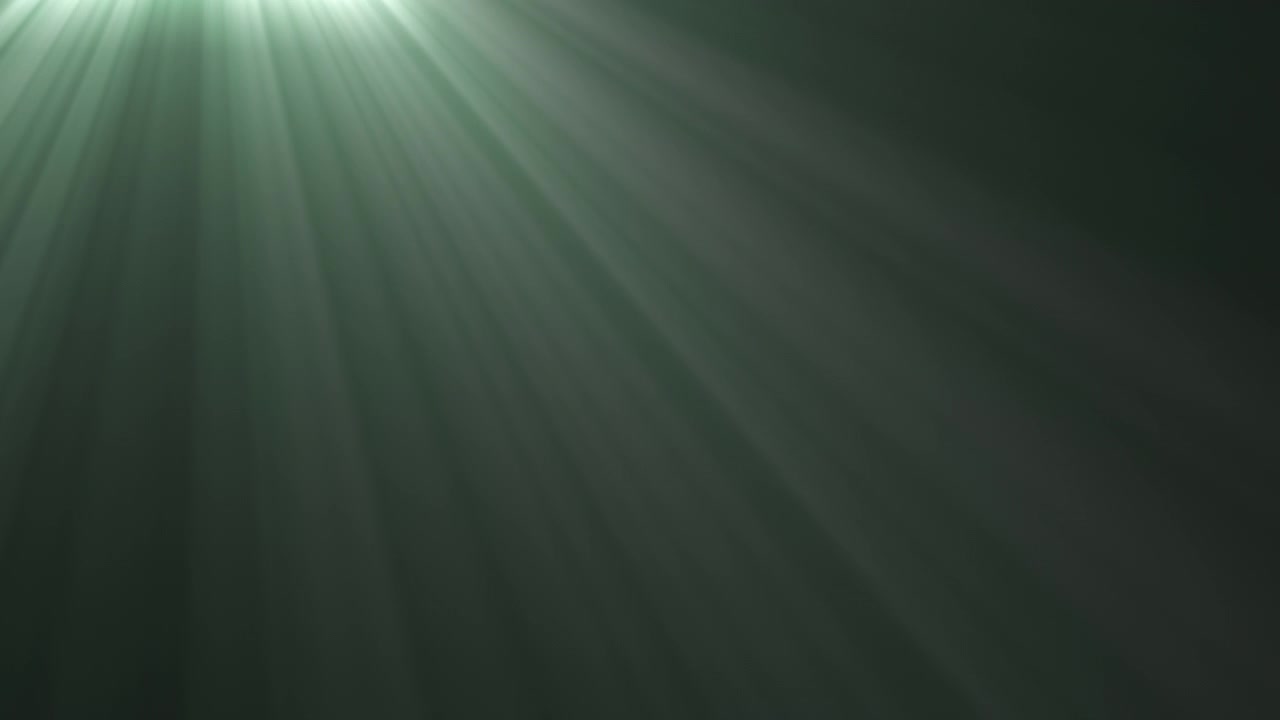 Raios de Luz Verde Suave Brilhando Através de Fundo Escuro