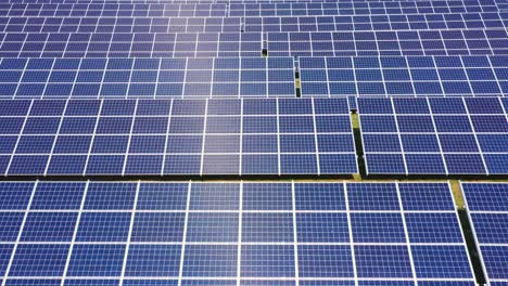 Closeup-of-surface-of-blue-photovoltaic-solar-panels-for-producing-clean-ecological-electricity