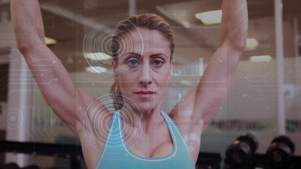 Istruttore di fitness su prompt HUD che abbassa le braccia verso l'esterno all'altezza delle spalle mentre la grafica traccia la forma.