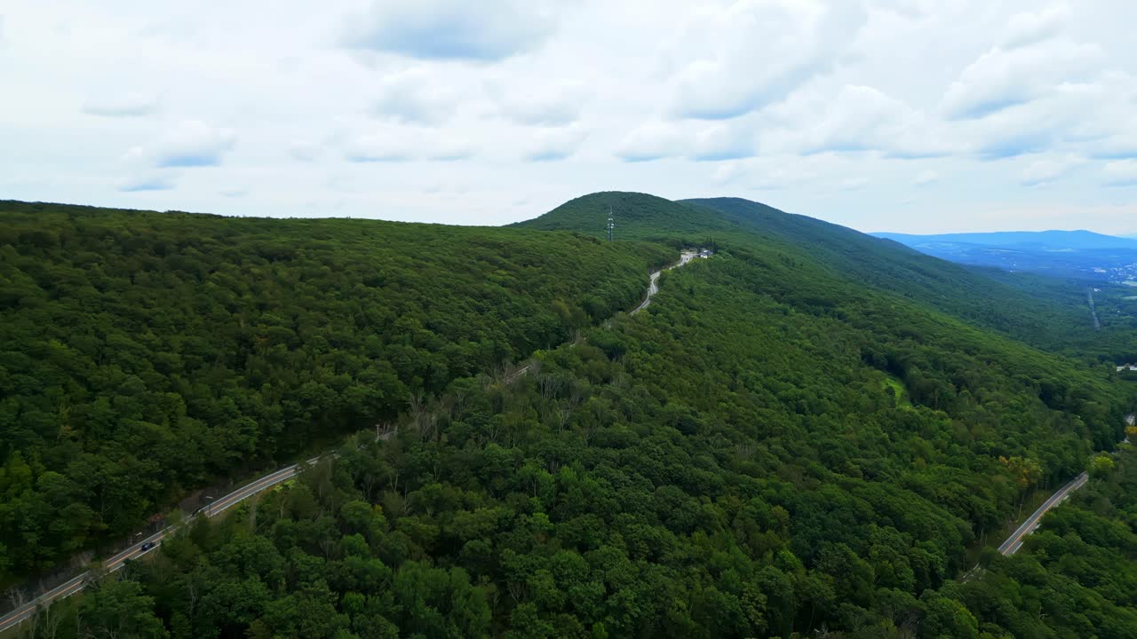 Scenic drone view of lush hills on Route 2 Mohawk Trail in Massachusetts