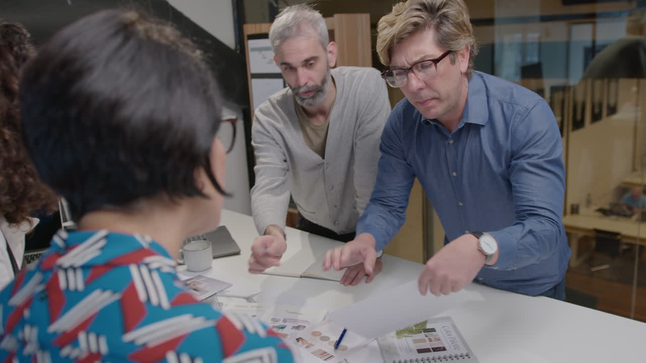 Mature Colleagues Brainstorming on Architectural Project