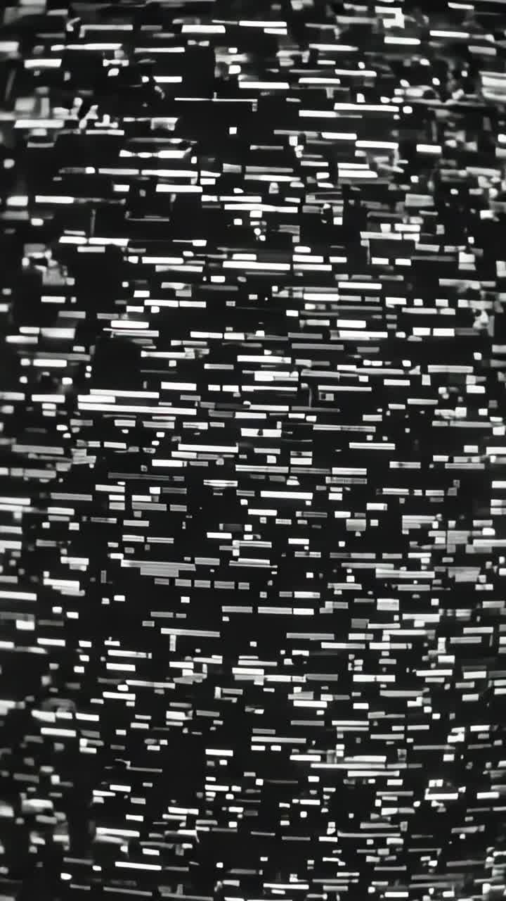 Vertical video: Evolving rectangular pixels reacting to signal change on display, forming scanlines