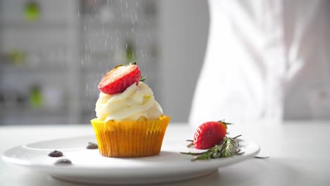decorated cupcake with strawberries