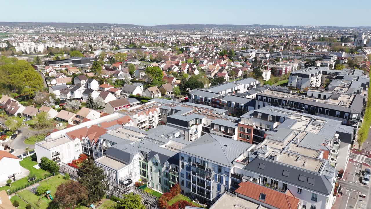 Drone flies forward over the city of Franconville in the Paris suburb - France