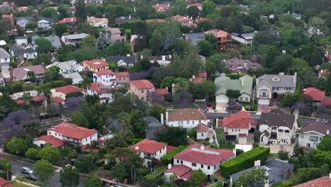 aerial view of westwood, neighborhood of los angeles ca usa, expensive homes in rich residential community, drone shot