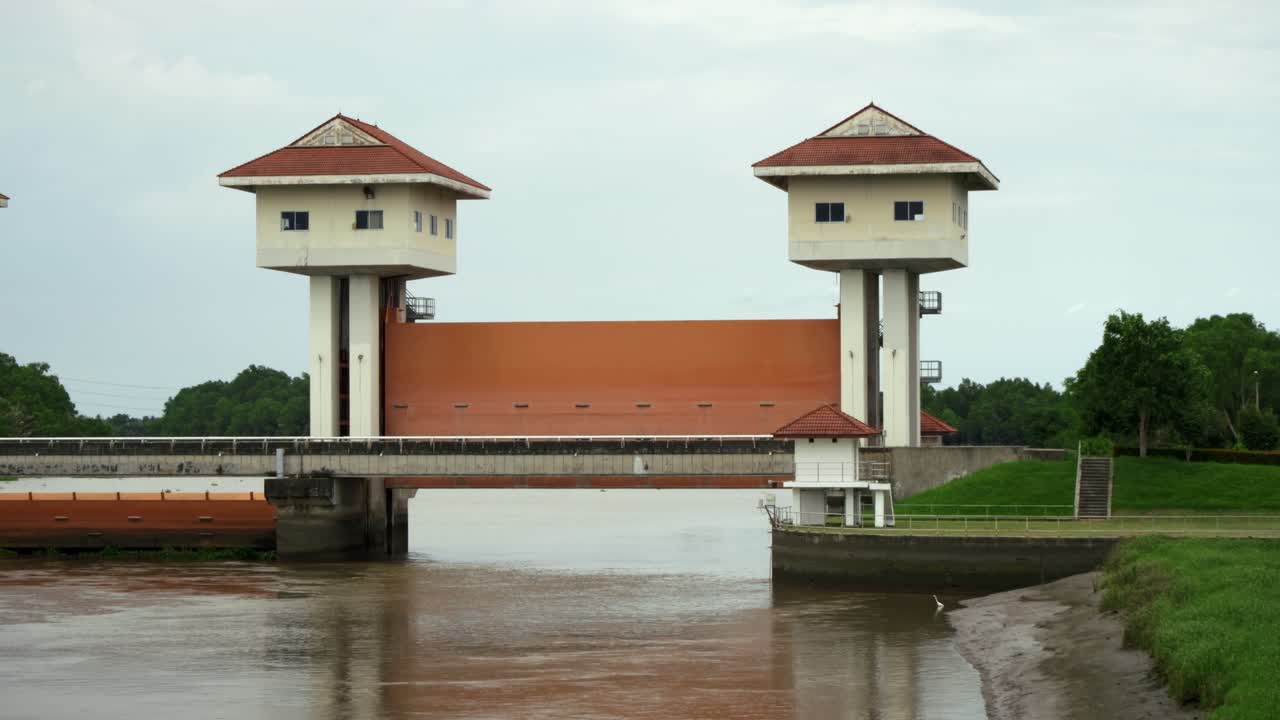 Explore the engineering behind a riverbank control structure designed for flood management and urban resilience.