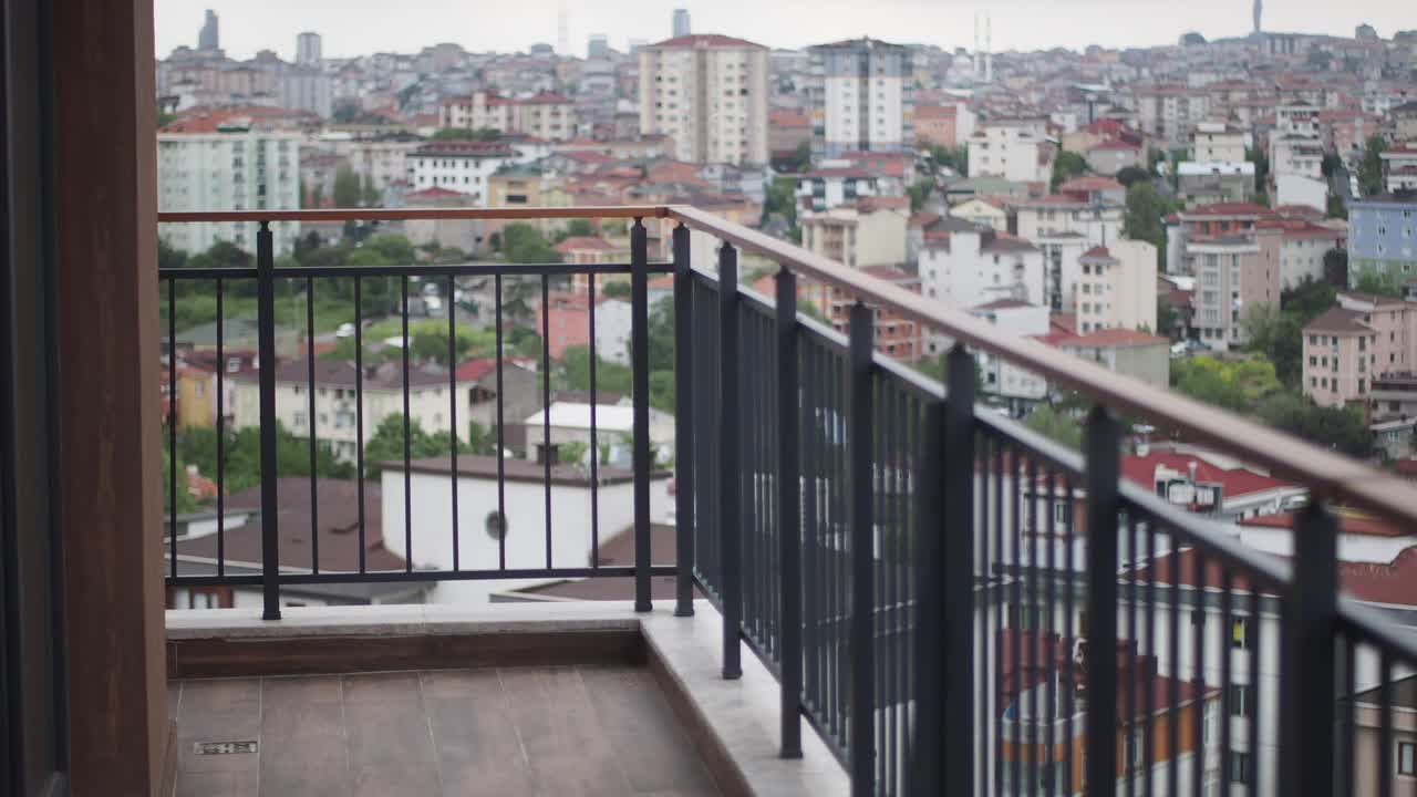 Cityscape view from a residential balcony