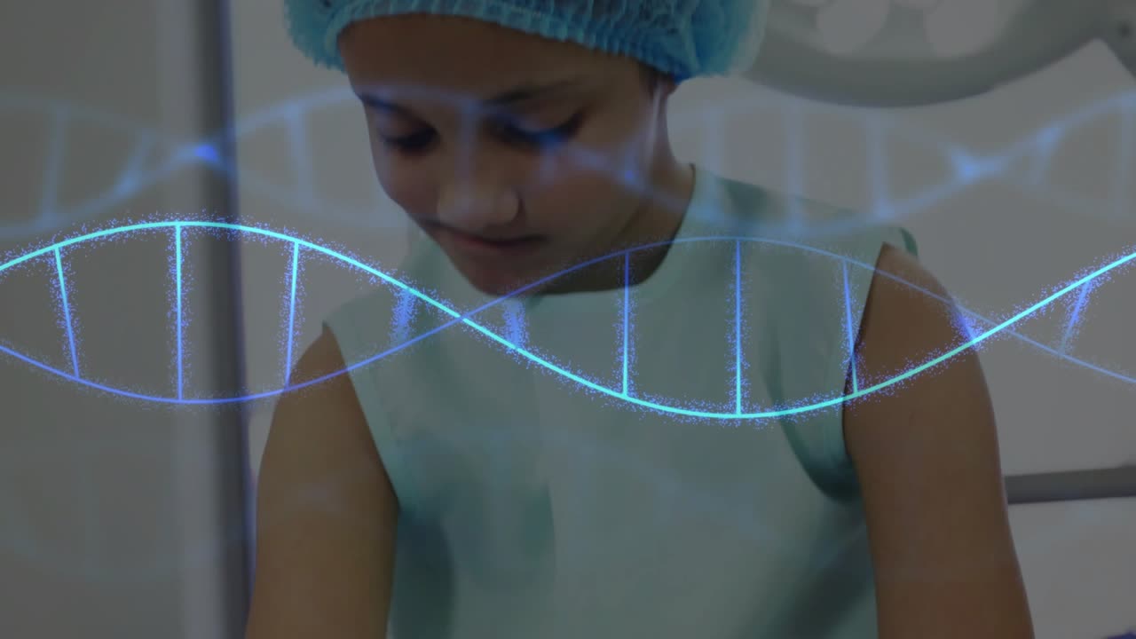 Video verticale: La telecamera si allontana rivelando un bambino che si sistema una benda, con un'elica di DNA pre-operatoria visualizzata sopra le mani.