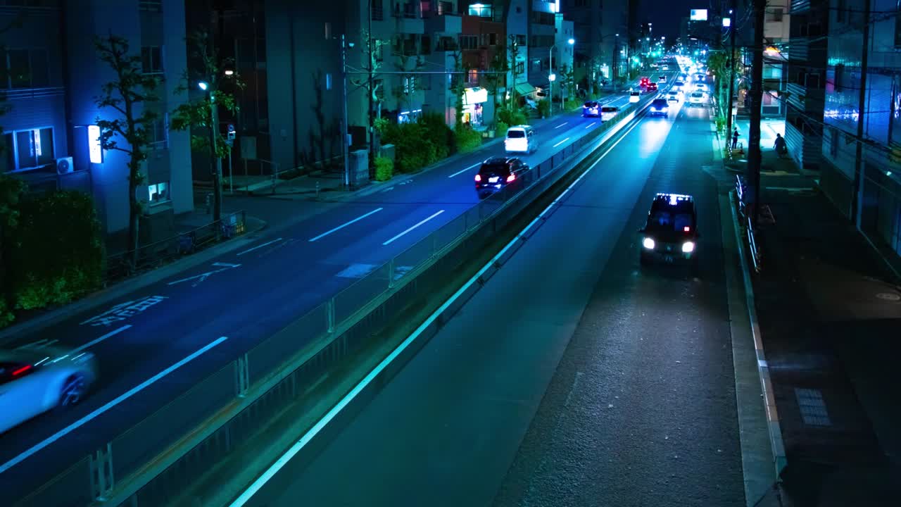 도쿄 시내 거리의 교통체증의 야간 타임스 화면