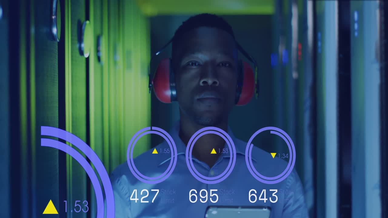 Animation of graphs and data over african american man in server room