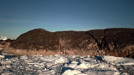 Aerial-view-of-the-impressive-ice-fiord-surrounding-Ilulissat,-Greenland