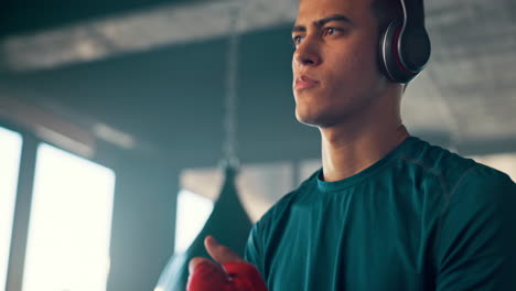 kickboxing, music and fitness with a man listening