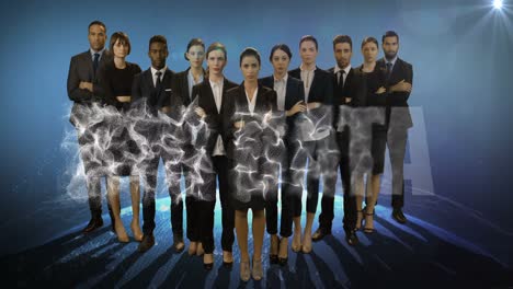 team of businesspeople standing with arms crossed