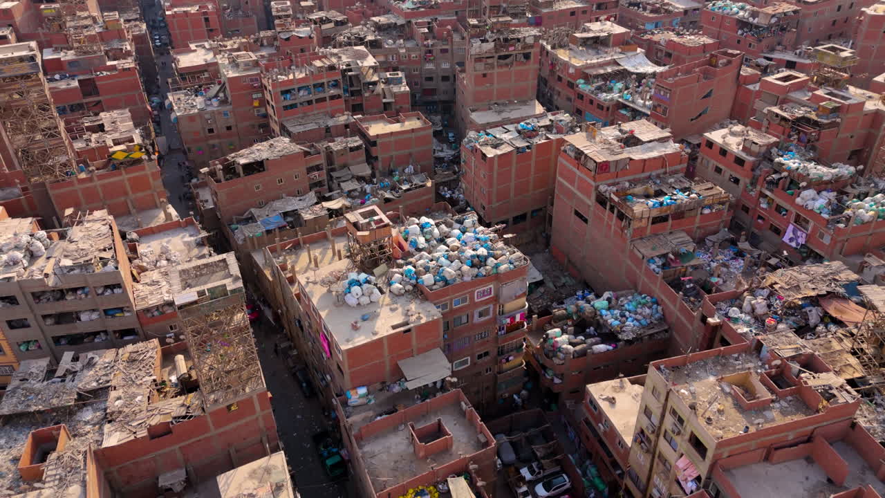 Zabaleen quarter showing homes and waste from the sky