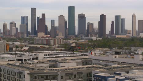 pulling away drone shot showing downtown houston, texas