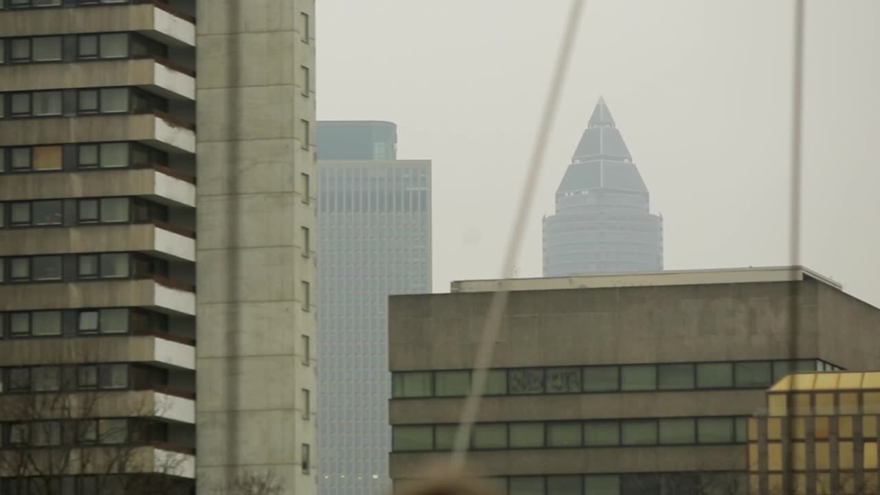 Low class apartment, panel building and modern Messturm in Frankfurt, Germany