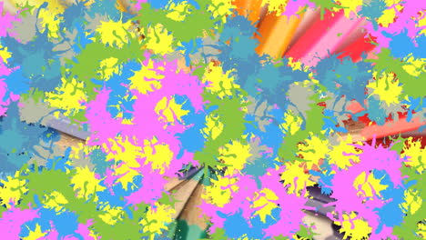 animation of colorful blots over crayons