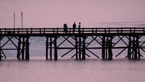 The-Mon-Bridge-is-an-old-wooden-bridge-located-in-Sangkla,-Thailand