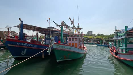 fishing boats moving gently on a calm river