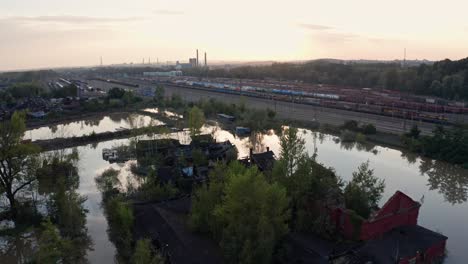 drone shot over flooded train station and ruined house in ostrava