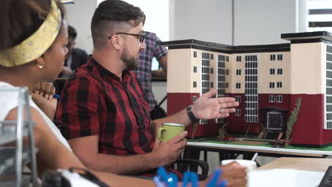 people looking at building model
