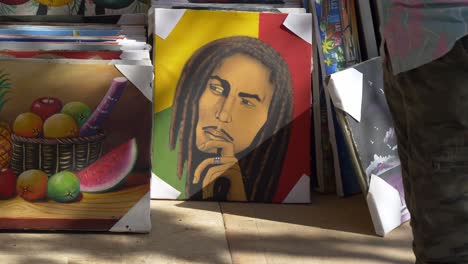 pinturas de retratos de bob marley en un mercado