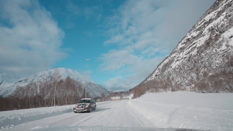 pov driving footage on snowy mountain roads during winter