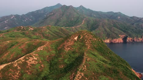 Aerial-view-of-Sharp-Peak,-countryside-and-hiking-route-in-Sai-Kung,-Hong-Kong