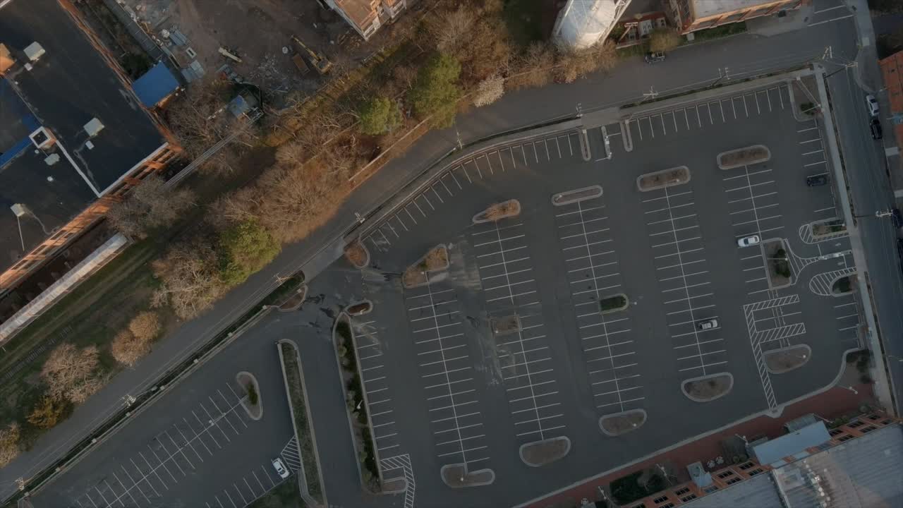 Aerial top-down view over parking of shopping center of Durham downtown in North Carolina